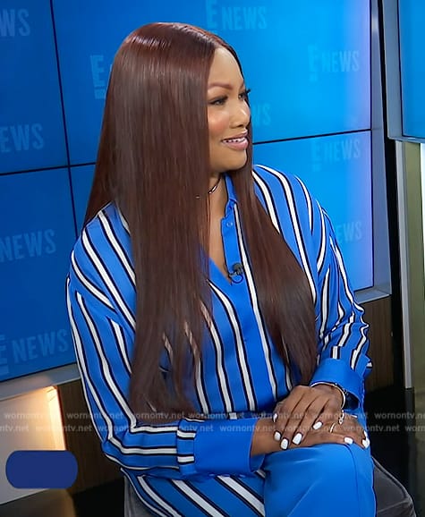 Garcelle’s blue stripe shirt and pants on E! News