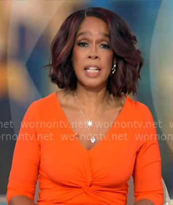 Gayle King's orange twist front dress on CBS Mornings