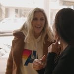 Gina’s white graphic hoodie on The Real Housewives of Orange County