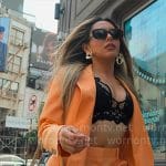 Jade’s orange suit with black lace bra on Owning Manhattan