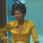 Jax’s yellow silk blouse on Reasonable Doubt