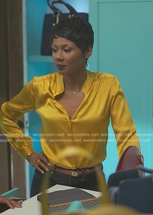 Jax's yellow silk blouse on Reasonable Doubt