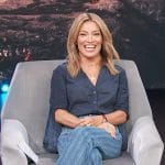 Kit’s navy ruched top and striped jeans on Access Hollywood