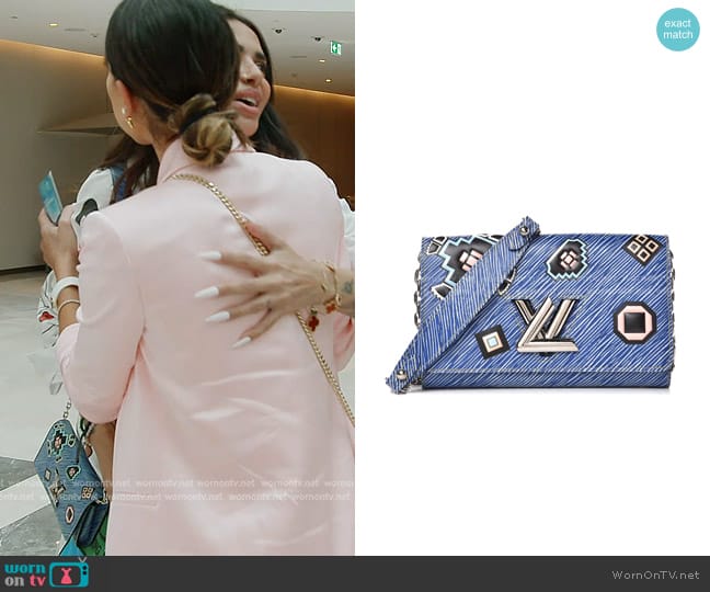 Louis Vuitton Epi Azteque Twist Chain Wallet Denim Light worn by Sara Al Madani (Sara Al Madani) on The Real Housewives of Dubai