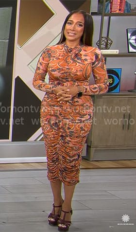 Michelle Miller’s orange printed ruched dress on CBS Mornings