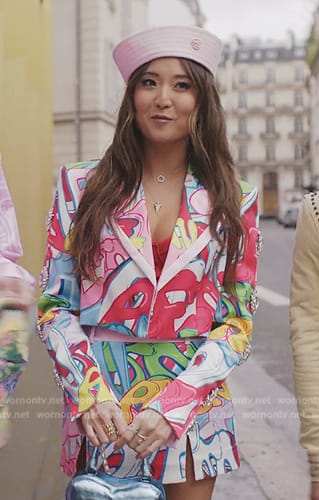 Mindy's graffiti print blazer and skirt on Emily in Paris