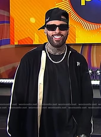 Nicky jam’s black side stripe jacket and pants on Good Morning America