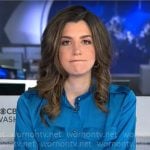 Nicole Sganga’s blue satin shirt on CBS Mornings