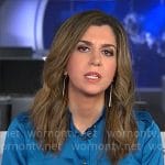 Nicole Sganga’s blue satin shirt on CBS Mornings