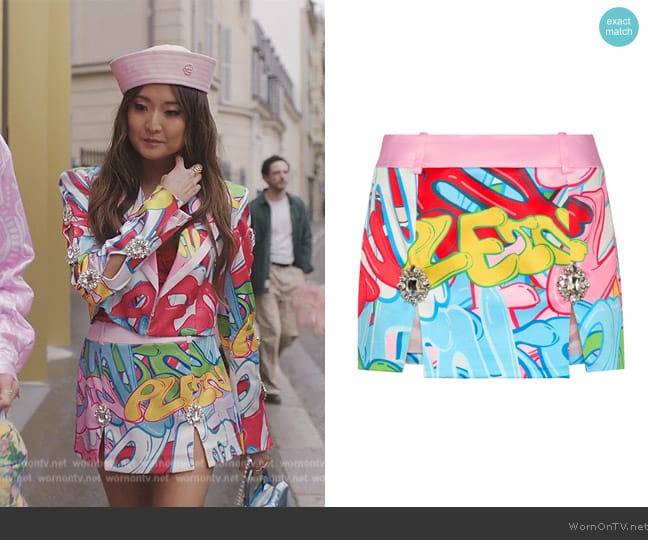 Philipp Plein Crystal-embellished graffiti-print miniskirt worn by Mindy Chen (Ashley Park) on Emily in Paris