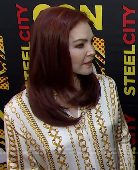 Priscilla Presley's chain print blouse on E! News