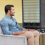 Sam Asghari’s western denim shirt and sneakers on Access Hollywood