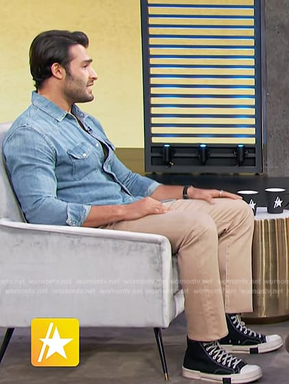 Sam Asghari’s western denim shirt and sneakers on Access Hollywood