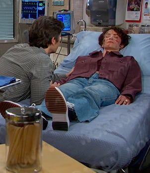 Sarah's black chunky sneakers on Days of our Lives