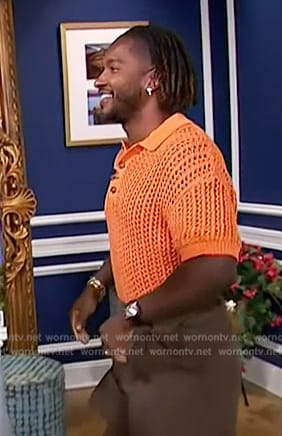 Scott's orange open knit shirt on Access Hollywood