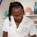 Scott’s white embroidered polo on Access Hollywood