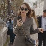 Sylvie’s gray suede wrap jacket and skirt on Emily in Paris