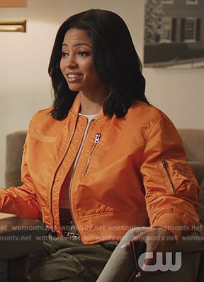 Thea’s orange satin jacket on All American Homecoming