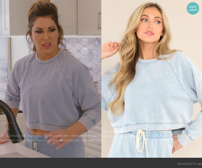 Z-Supply Crop Out Washed Denim Sweatshirt worn by Emily Simpson on The Real Housewives of Orange County