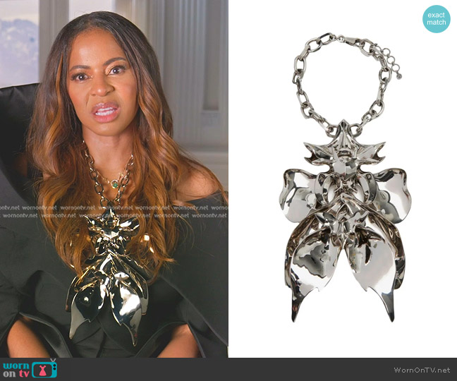 Alexander McQueen Orchid Silvertone Pendant Necklace in White Gold worn by Mary Cosby on The Real Housewives of Salt Lake City