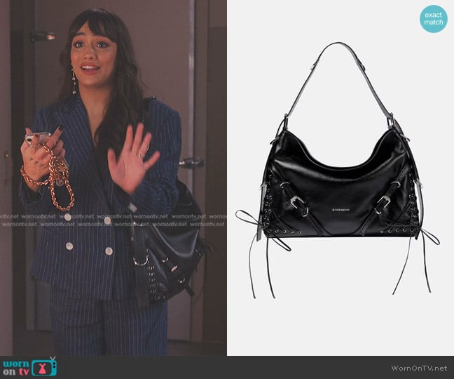 Genevieve’s black leather bag on Emily in Paris