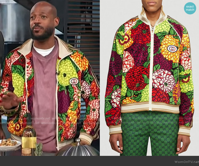 Gucci X Ken Scott Floral Printed Bomber Jacket worn by Marlon Wayans on Access Hollywood