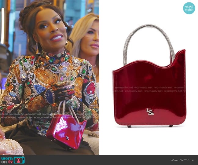 Le Silla Ivy Patent-leather Mini Bag worn by Caroline Brooks (Caroline Brooks) on The Real Housewives of Dubai