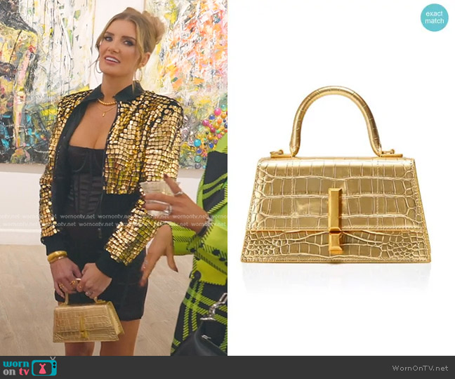 Nissa Leather Gold Shoulder Bag worn by Nicole Young on Selling Sunset