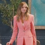 Alanna’s coral suit and sunglasses on Selling Sunset