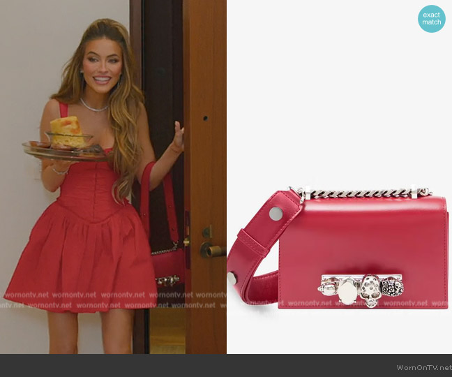 Alexander McQueen The Biker Mini Jewelled Satchel in Lipstick Red worn by Chrishell Stause on Selling Sunset