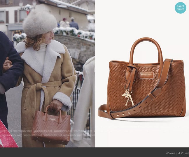 Aspinal of London Midi London Woven Leather Tote Bag worn by Louis (Camille Japy) on Emily in Paris