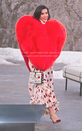 Bronwyn's white lip print dress and heart jacket coat on The Real Housewives of Salt Lake City