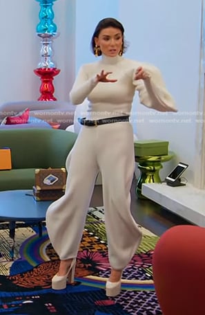 Bronwyn’s white ribbed asymmetric sweater and pants on The Real Housewives of Salt Lake City