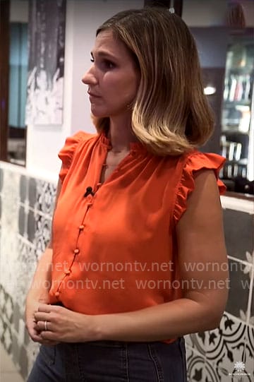 Caitlin Huey-Burns' orange ruffle trim top on CBS Mornings