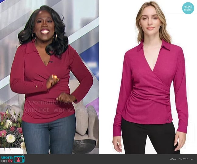 Calvin Klein Knit Long Sleeve Faux Wrap Blouse in Mulberry worn by Sheryl Underwood on The Talk