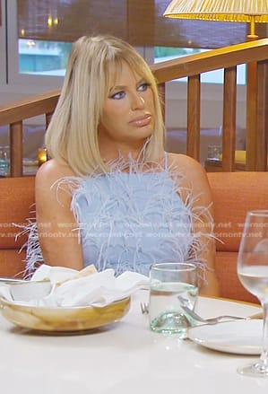 Caroline’s light blue feather trim dress on The Real Housewives of Dubai