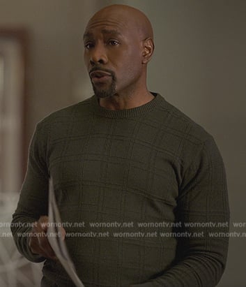 Corey’s green check print sweater on Reasonable Doubt