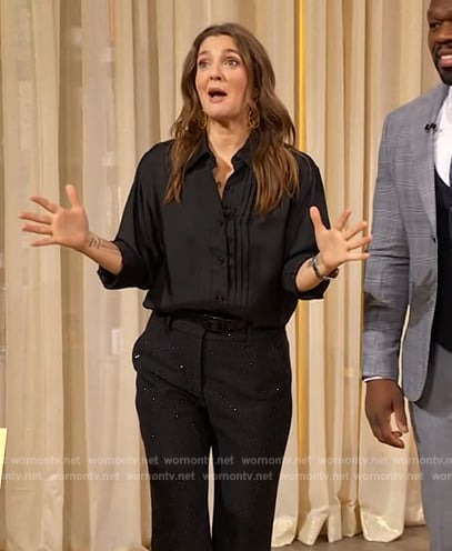 Drew's black pleated blouse and sequin pants on The Drew Barrymore Show