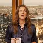 Drew’s navy pleated satin blouse on The Drew Barrymore Show