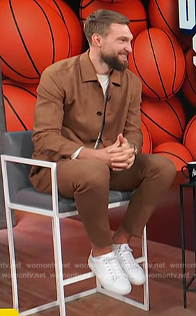 Domantas Sabonis’s brown jacket and pants on Access Hollywood