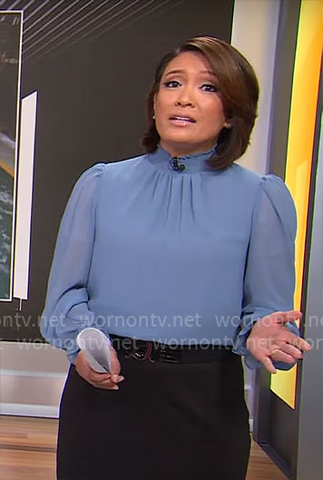 Elaine Quijano's sheer blue blouse on CBS Mornings