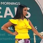 Elizabeth Werner’s yellow ruffle top and floral pants on CBS Mornings