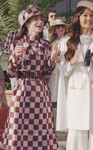 Emily's pink check trench coat and top on Emily in Paris