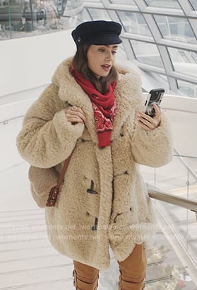 Emily's beige fur coat on Emily in Paris