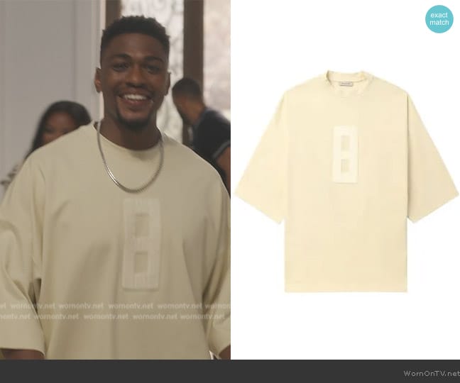 Fear of God Embroidered-eight oversized T-shirt worn by LaMarcus (Justin Cornwell) on Bel-Air