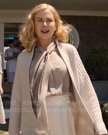 Greer’s taupe tie neck blouse, woven cardigan and white pants on The Perfect Couple