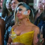 Jade’s yellow strapless dress and face earrings on Owning Manhattan