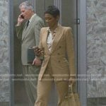 Jax’s floral blouse and beige suit on Reasonable Doubt