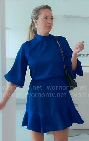 Jess T's blue dress on Owning Manhattan