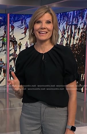 Kate's black short sleeve pleated top on NBC News Daily